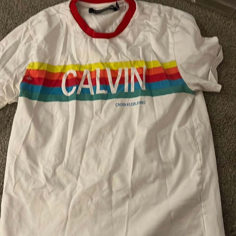 Calvin Klein white T-shirt with a colorful strap at top